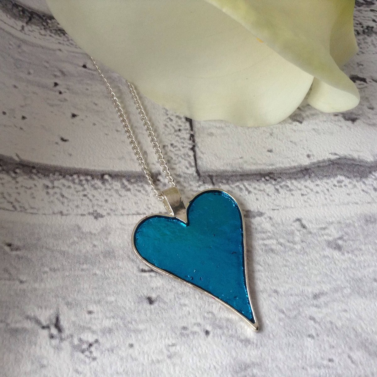 ArtisanJByViv's tweet photo. Gift For Valentine's Day, Blue Resin Necklace, Blue Heart Necklace, Blue Bridesmaid Necklace, Gift For Teenager, Emo Pendant, Gift For Goth https://t.co/ta29aDurYJ #Etsy #BeadsofCreation #BlueHeartNecklace https://t.co/njQpLOCLHC