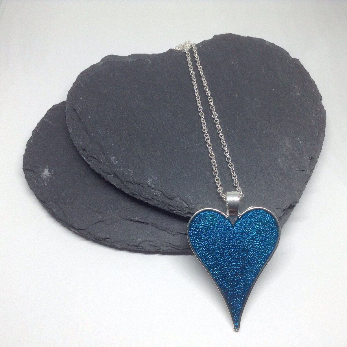ArtisanJByViv's tweet photo. Gift For Valentine's Day, Blue Resin Necklace, Blue Heart Necklace, Blue Bridesmaid Necklace, Gift For Teenager, Emo Pendant, Gift For Goth https://t.co/ta29aDurYJ #Etsy #BeadsofCreation #BlueHeartNecklace https://t.co/njQpLOCLHC
