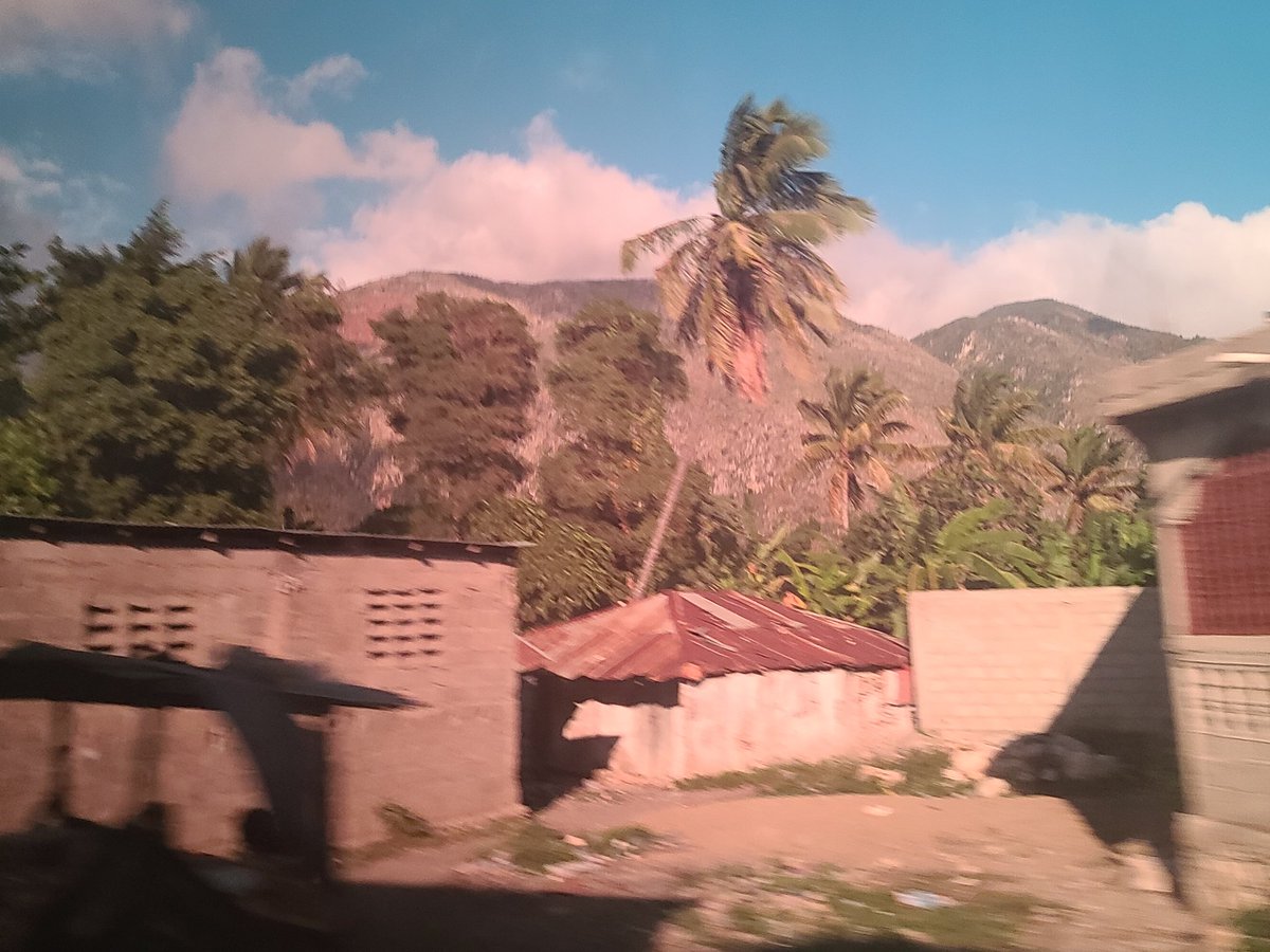 Saturday we hit the road for a 3 day excursion. No filter. Taken through dark tinted windows that made my black bag appear red.  #Haiti