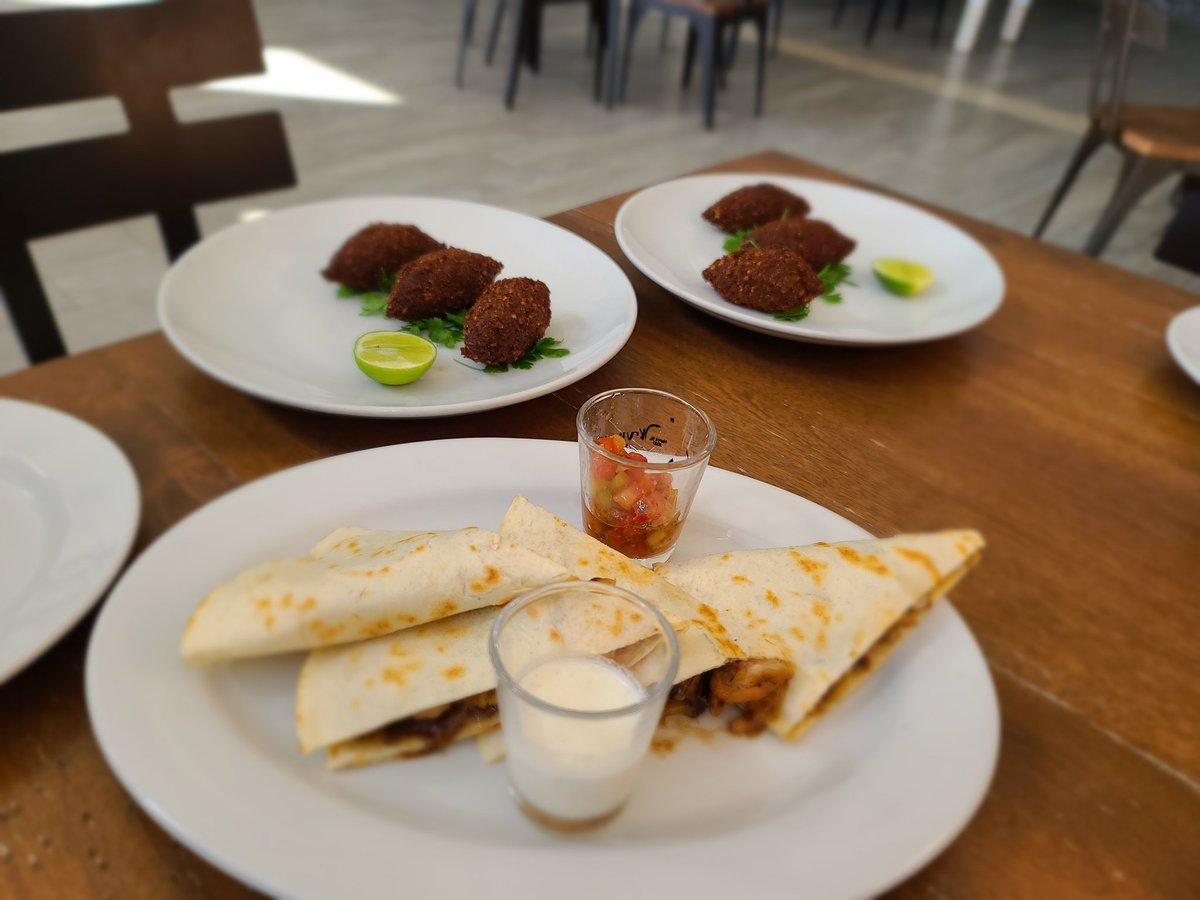Sunday lunch. Griyo sandwich was delicious. The bread was incredible.  #Haiti