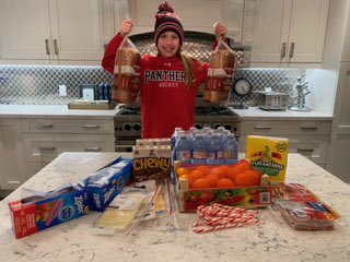 This week, our U11AA team made meals and collected hats, socks and gloves for the less fortunate at the Good Sheppard. The Panthers were hard at work donating 150 meals and together with the YSE we donated 421 meals and a mountain of hats and socks to give some much needed warmth