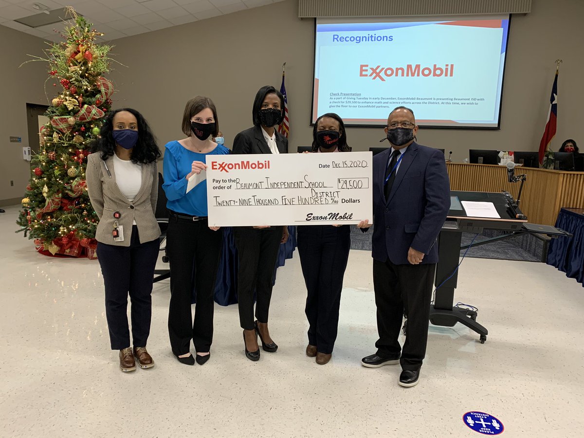 exxonmobilbmt's tweet photo. On the 7th Day of Energy, we present a donation to the @BeaumontISD! #12DaysofEnergy https://t.co/h3NhGmS4uF