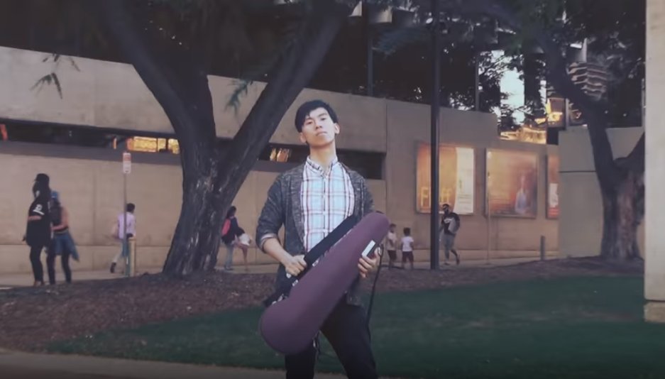 More Southbank (Google Maps says this is the Cultural Forecourt). The building behind Eddy is the Queensland Performing Arts Centre. Eddy would have performed there when he was playing in the Queensland Symphony Orchestra.