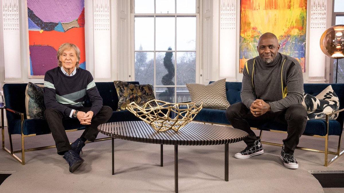 BBC's tweet photo. In a world exclusive, two of the biggest names in entertainment come together for a very special one-off show.

Music legend @PaulMcCartney is interviewed by Golden Globe-winning actor @idriselba 🤩🤩

Saturday 19th December, 9.20pm, @BBCOne and @BBCiPlayer. https://t.co/OUoBURqe82