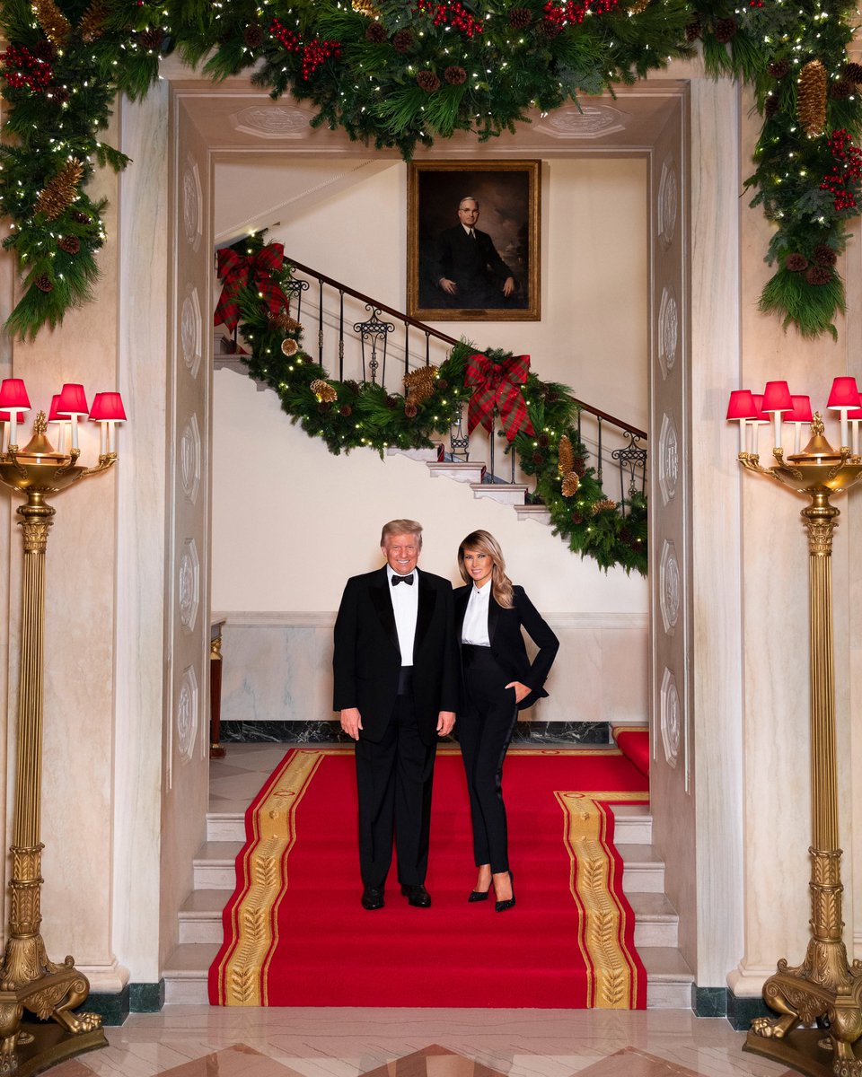Merry Christmas from President Donald J. Trump and First Lady Melania Trump. 
<a href="/realDonaldTrump/">Donald J. Trump</a> &amp; <a href="/FLOTUS/">First Lady Melania Trump</a> are seen December 10, in their official 2020 Christmas portrait,on the Grand staircase of the White House in Washington, D.C. (Official White House Photo by Andrea Hanks)