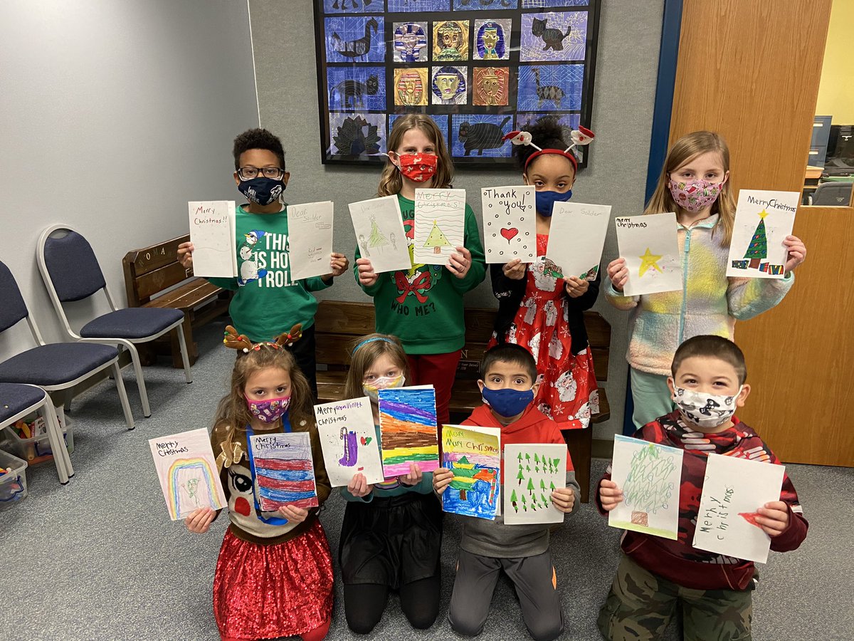 HomanElementary's tweet photo. Homan students show their holiday cards made for troops deployed on the USS Nimitz https://t.co/AMIdfaA56X