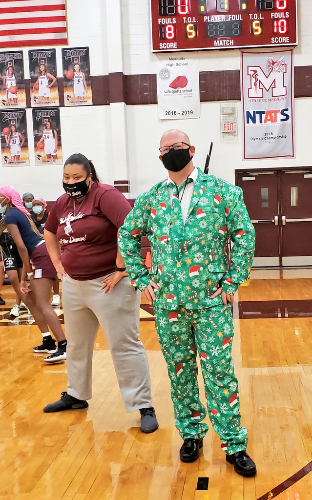 MesquiteHS's tweet photo. On the twelfth &amp; final day of our holiday countdown, we're sporting our Skeeter gear with some of us "wrapped" in the spirit! Our pile of Toys for Tots &amp; Teens is growing &amp; our staff is loving their gifts - MHS backpacks! #WrappedInHolidaySkeeterSpirit #MHS12Days https://t.co/4WU1Bi2C21