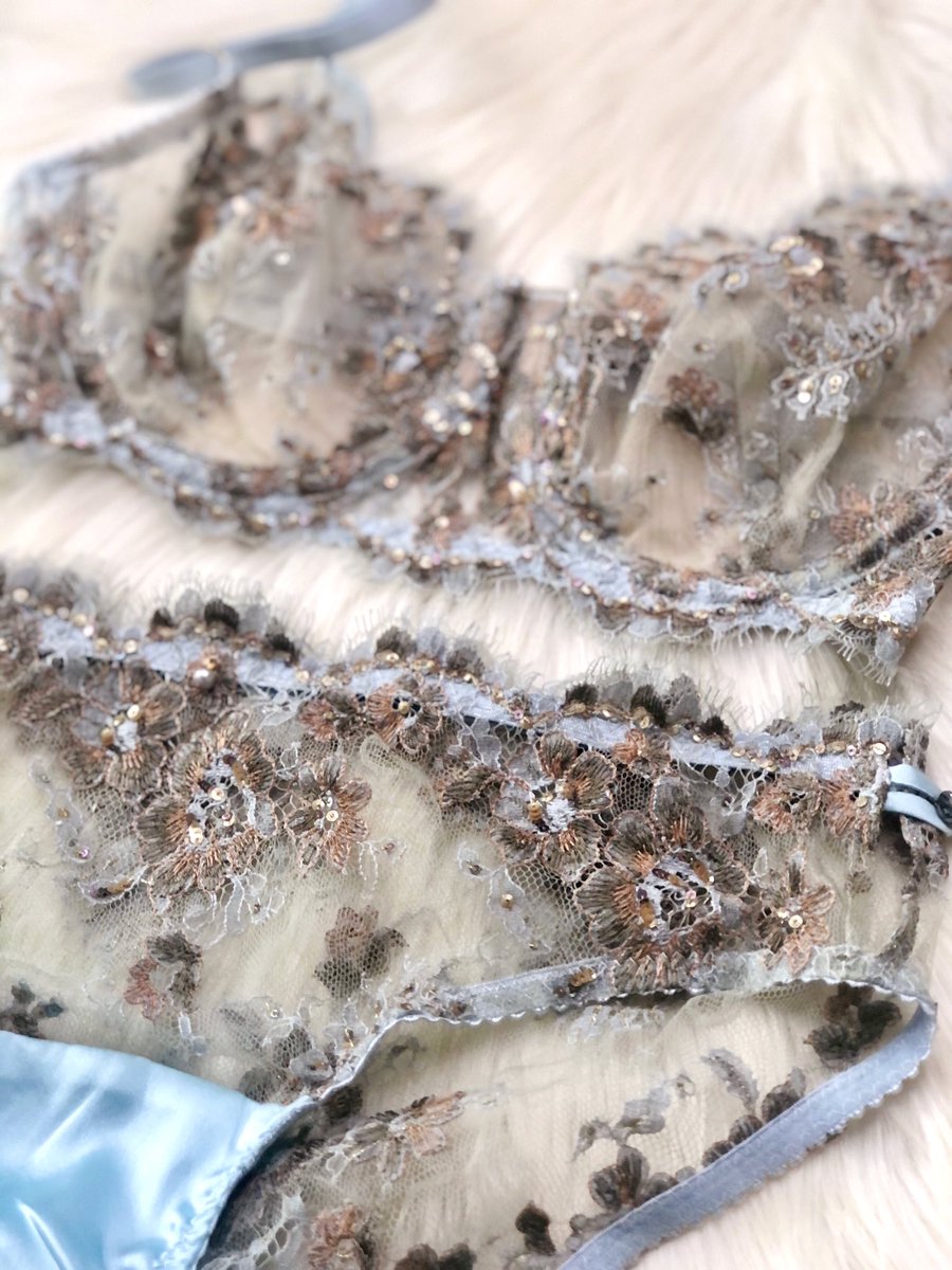 Zooming in on the same place in this photo, you can see a zigzag stitch also used to attach that hand-dyed and perfectly color-matched trim. This is non-stretch lace, so this stitch not only allows the garment to accommodate the body, it keeps the fabric edges from fraying.