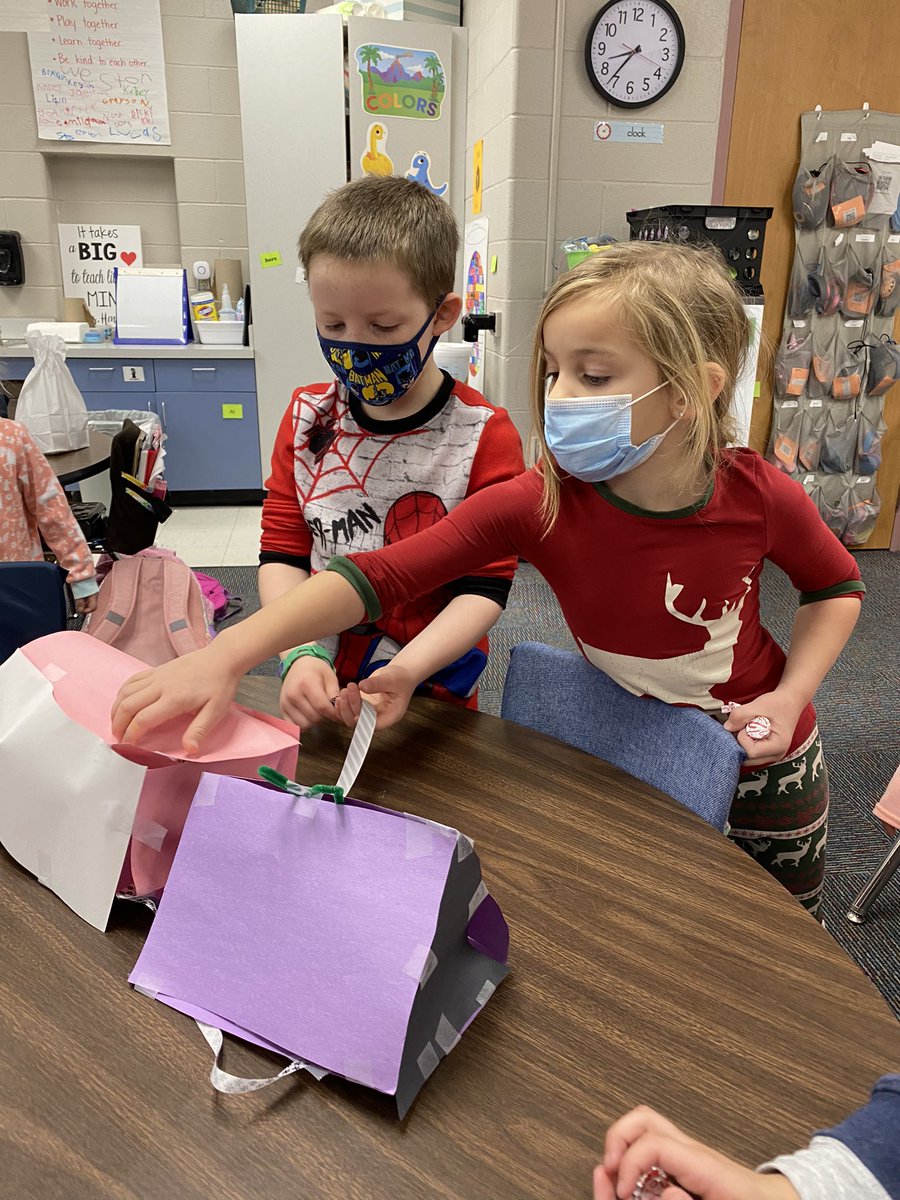 Kindergarten students were excited to show me their elf traps this morning! They worked in teams to design and build their traps. These teams were reflecting on how they could improve their design to catch the elf next time.