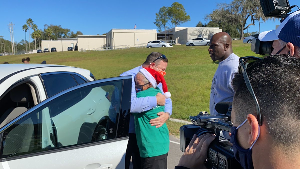 HillsboroughSch's tweet photo. Surprise of a lifetime today at ⁦@SlighMiddle⁩! ⁦@TitusONeilWWE⁩ and ⁦@ElderFordTampa⁩ presented a brand new car to Virginia Lowell, a 27-year cafeteria employee of the school. ❤️ by the students &amp; staff this was a celebration indeed!#JoyofGiving ⁦@BFFTampa https://t.co/waMY1povl9