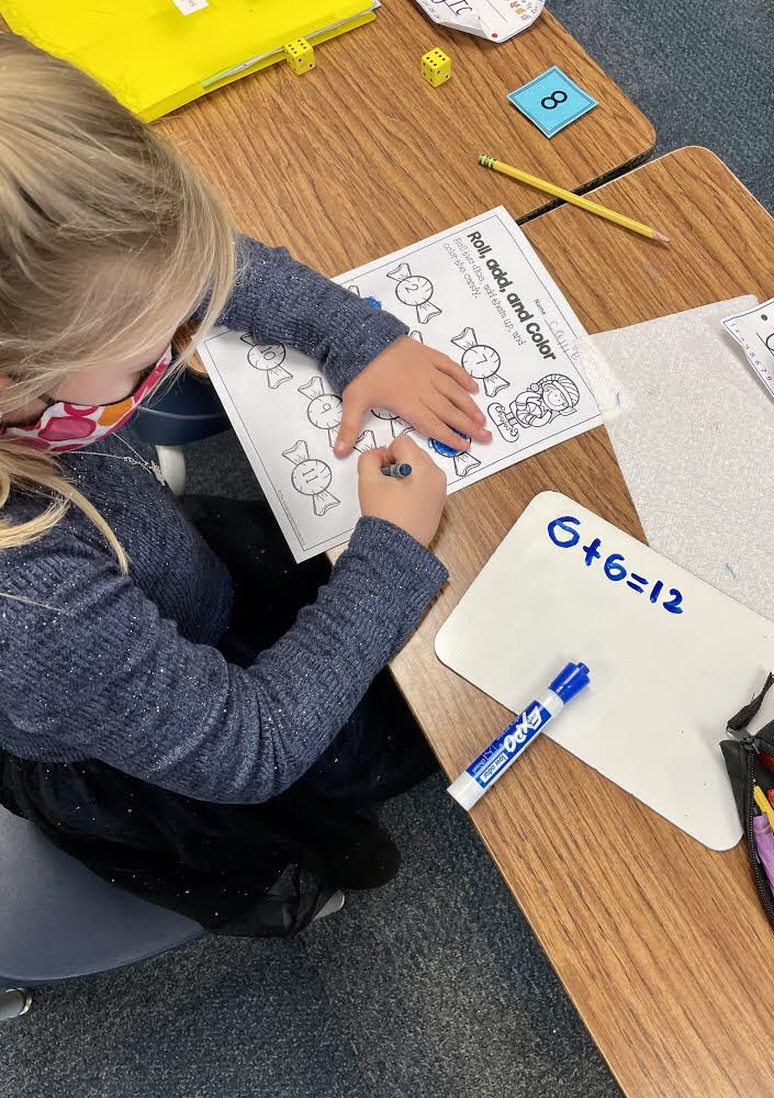 D301Math's tweet photo. What a fun way to wrap up addition before the holiday break! Look at these smarties creating equations 🤗 @MissBallard_ @301Lions https://t.co/sTniSzIbte