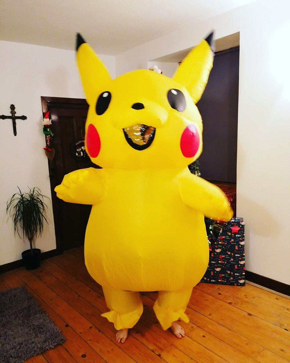 My Xmas tree. Unfortunately there is a bloody great pikachu standing in front of it 🎄