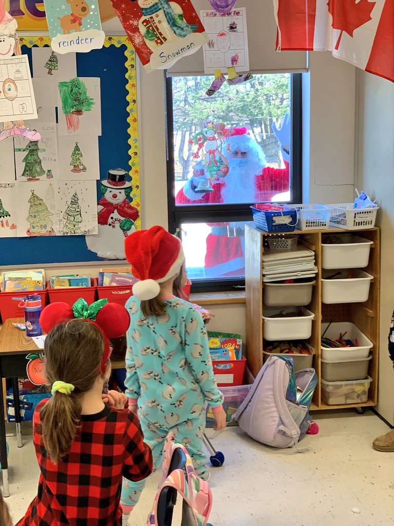 OLG_YCDSB's tweet photo. Someone very special came to visit the students of @OLG_YCDSB today (from a safe distance, of course). Such excitement to see jolly old St. Nicholas waving from the school parking lot through our classroom windows! @YCDSB @ElizabethCrowe_ https://t.co/OIra1PXBnL