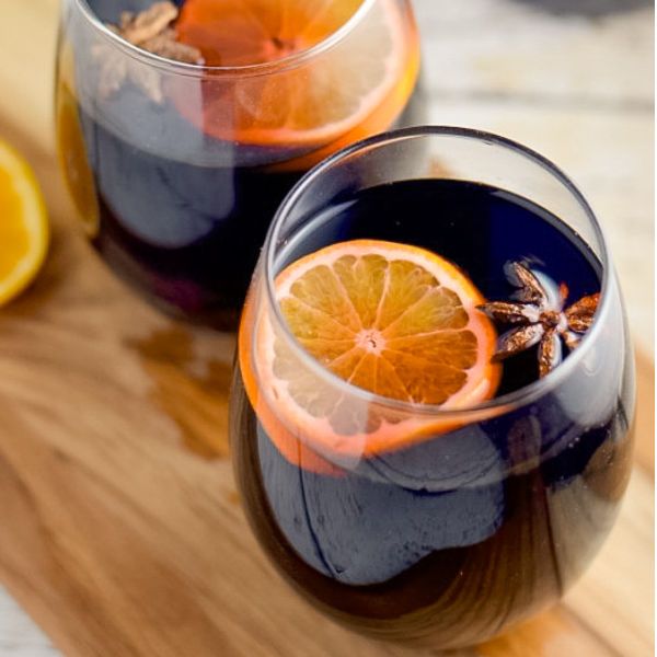 Crock Pot Mulled Wine. This warm, spicy cocktail kicks ass and whips up in no time! Just dump it in your slow cooker and enjoy all day! #crockpot #cocktails #winerecipes #alcohol quirkyinspired.com/crockpot-mulle…