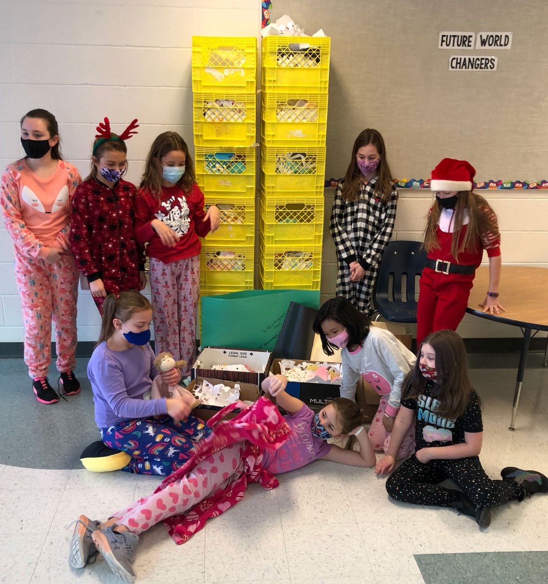 The grand total for snowflakes created and counted is 5164! That's impressive. Over 1/2 way to 10 000. Maybe next year will try again and see if we can get closer to 10 000. 
Check out how many containers we needed to hold 5164 snowflakes.