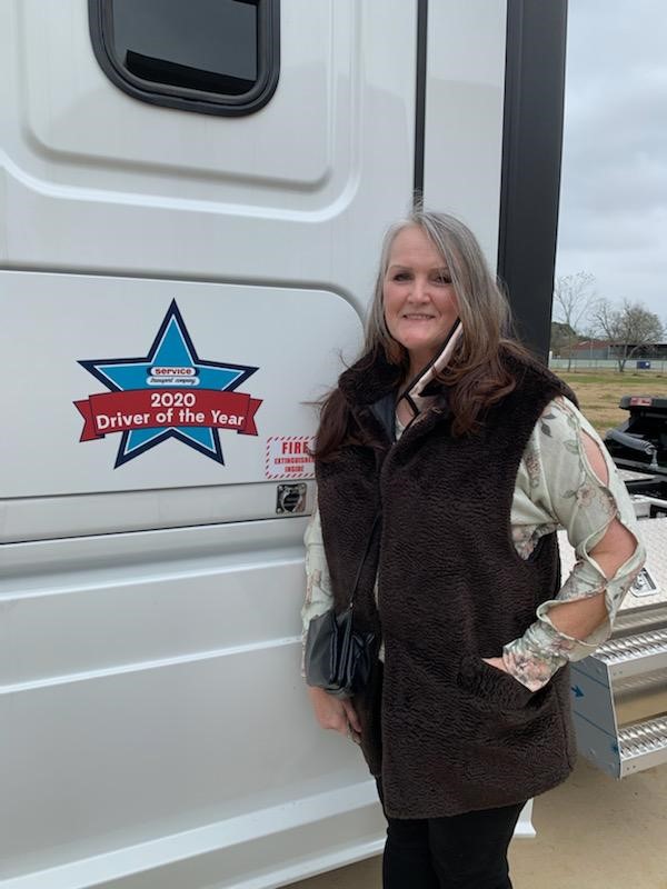 ServiceTransCo's tweet photo. The STC Driver of the Year is DONNA WRIGHT.    Donna will receive $1K and be will also be assigned a fully loaded new Freightliner truck to drive! Congratulations Donna! (Pictured Donna Wright, STC Driver, Stacey Lewis, Terminal Manager and Wade Harrison, STC President.) https://t.co/W4cKiQUetE