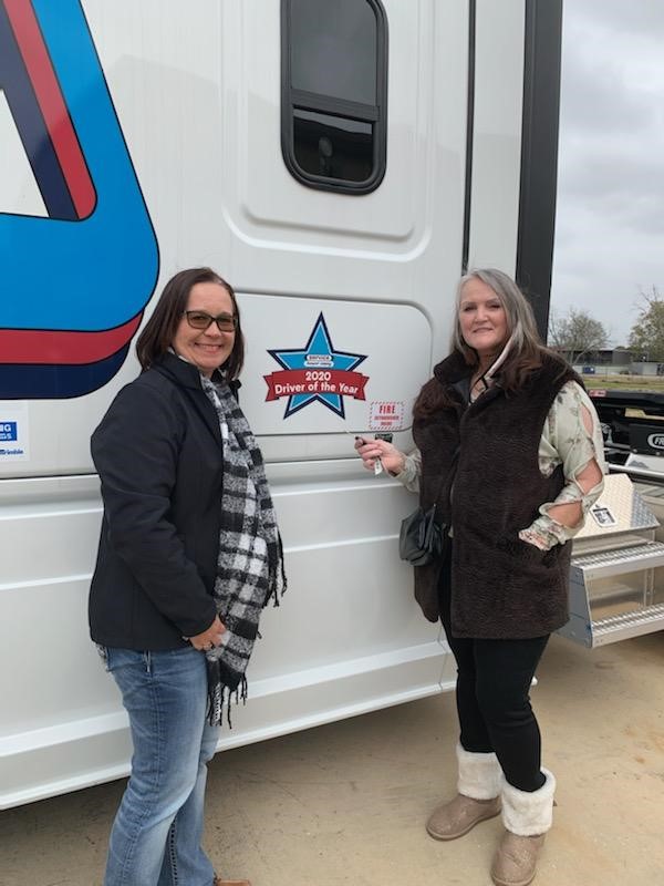 ServiceTransCo's tweet photo. The STC Driver of the Year is DONNA WRIGHT.    Donna will receive $1K and be will also be assigned a fully loaded new Freightliner truck to drive! Congratulations Donna! (Pictured Donna Wright, STC Driver, Stacey Lewis, Terminal Manager and Wade Harrison, STC President.) https://t.co/W4cKiQUetE