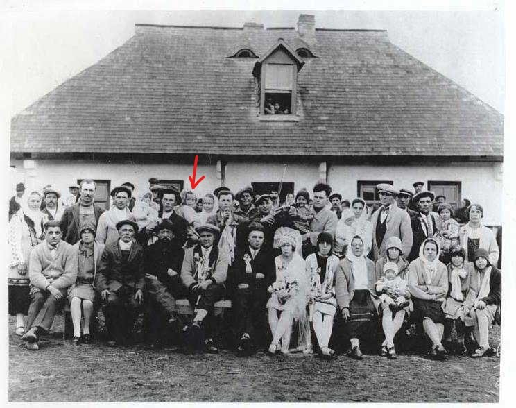 Her parents, Nistru O. and Paulina Paulencu, were part of a larger group of settlers from Bukovina to settle at Lennard MB. Grandma grew up with these folks in a tight-knit community. Here she is at 5 yrs old in her mom’s arms. Her dad and younger sister are to her right.