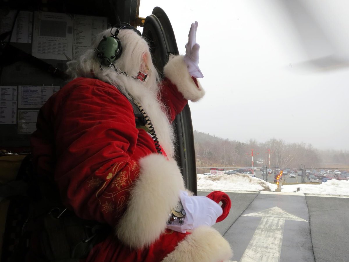 SantaClausInfo's tweet photo. Thank you to the wonderful team at 103 Search and Rescue from Gander. Santa had a great visit to the @JanewayNL and is now safely back in the #NorthPole. Don't worry, #Santa was well strapped in! https://t.co/U0YzxGVUVx