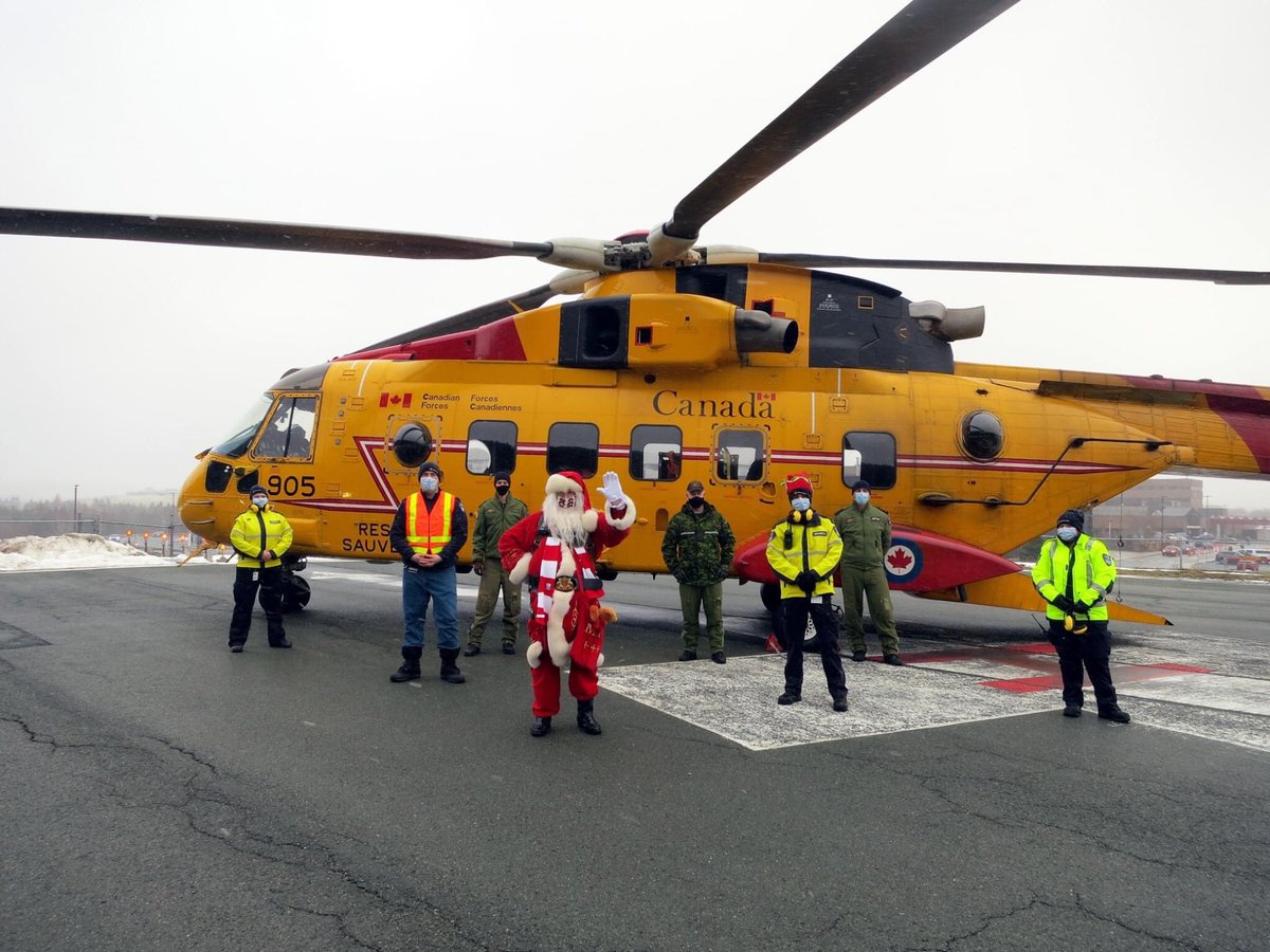 SantaClausInfo's tweet photo. Thank you to the wonderful team at 103 Search and Rescue from Gander. Santa had a great visit to the @JanewayNL and is now safely back in the #NorthPole. Don't worry, #Santa was well strapped in! https://t.co/U0YzxGVUVx
