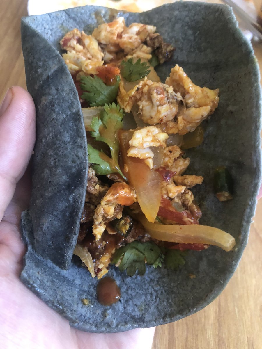 Various tacos: Tex-Mex, birria oxtail, breakfast, and a Chipotle burrito replica