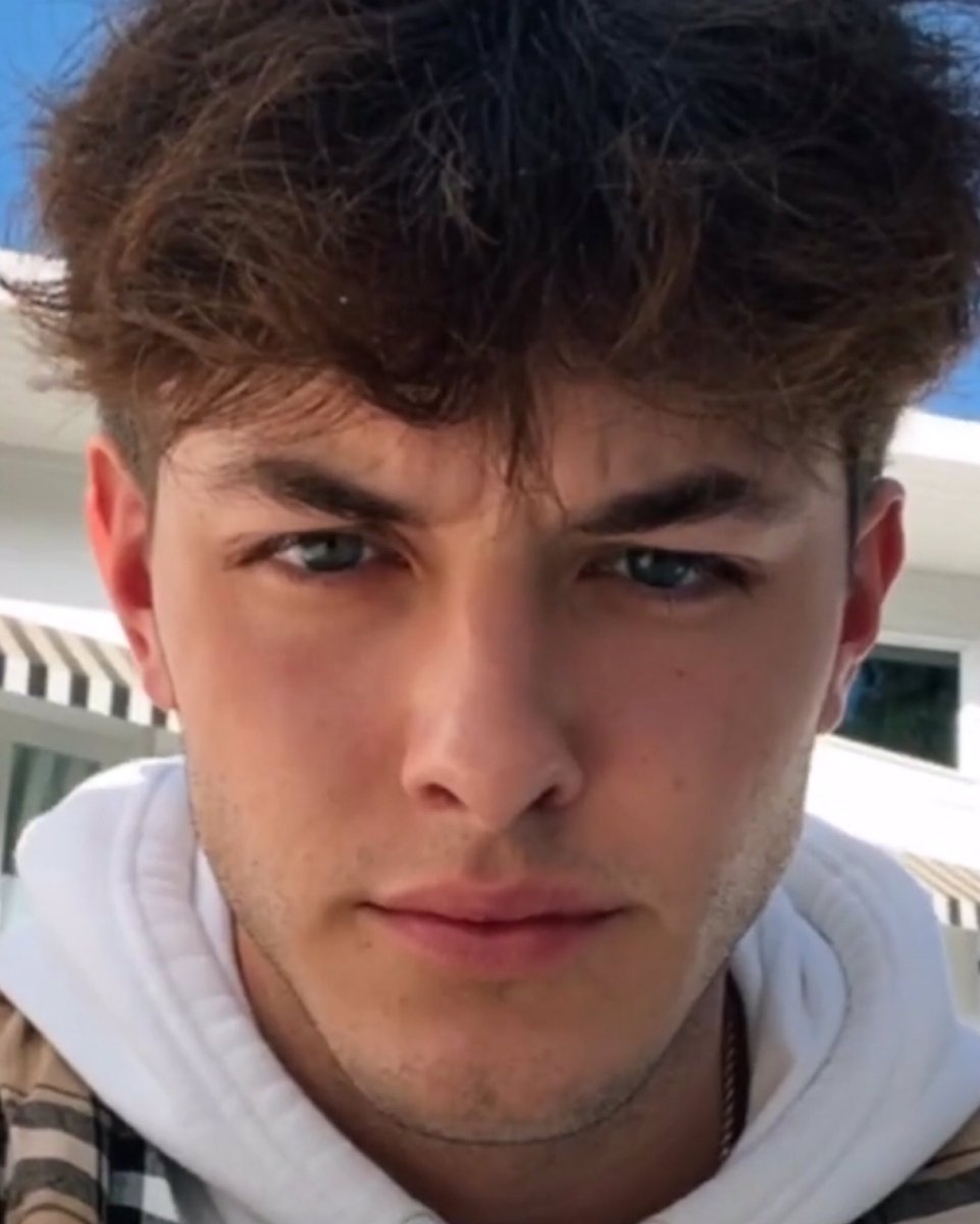 griffin won a no-blinking contest. his rival was a statue