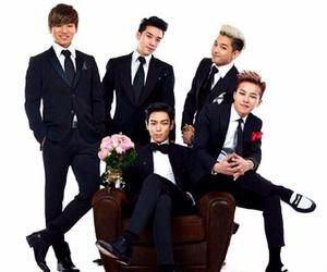 with his bros in suits 