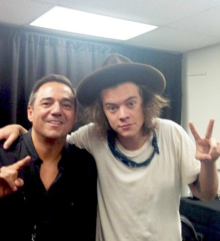 on stage. back stage. on his head.. around his neck... there's always a blue bandana .