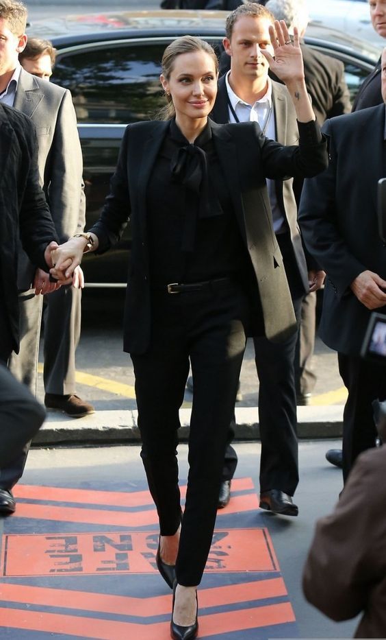 wickedjolie's tweet photo. angelina jolie in suits hits differently https://t.co/hFIvbc5Y7W