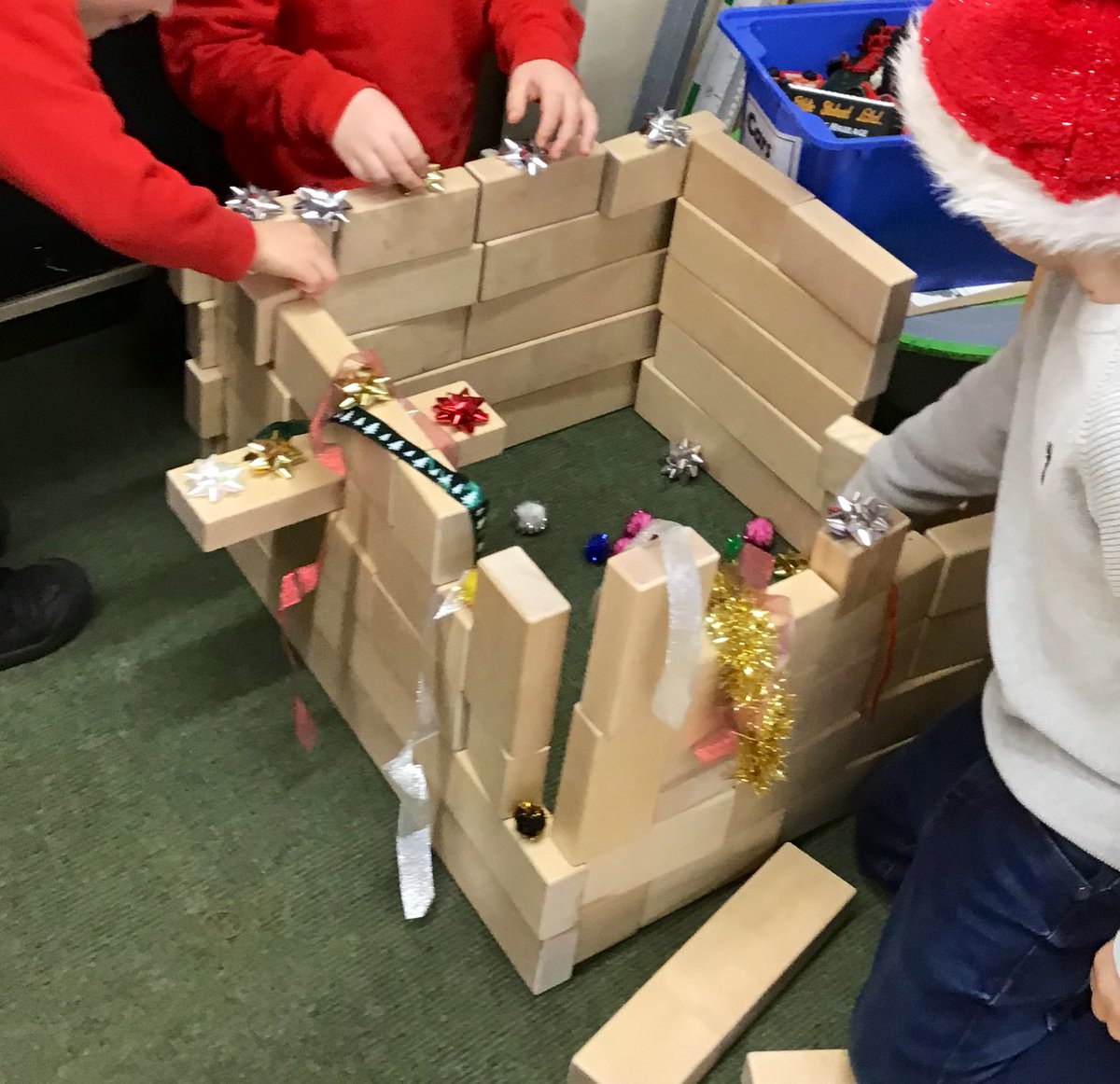 karlacpearce's tweet photo. A few more fabulous creations from our indoor and outdoor block play areas. This week children were keen to decorate their structures for Christmas! #blockplay #blocksrock #notjustplaying #earlymaths #mathsthroughplay #play4p1 #teamwork #collaboration #problemsolving https://t.co/OAqGNn0AM6
