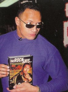 By 2000, The Rock was a massive superstar. His autobiography was #1 on the NYT bestseller list. In April, he hosted SNL. Access Hollywood named him #6 in the list of Top 10 Celebrities of 2000 and was one People Magazine's list of the Top 25 Most Intriguing People.