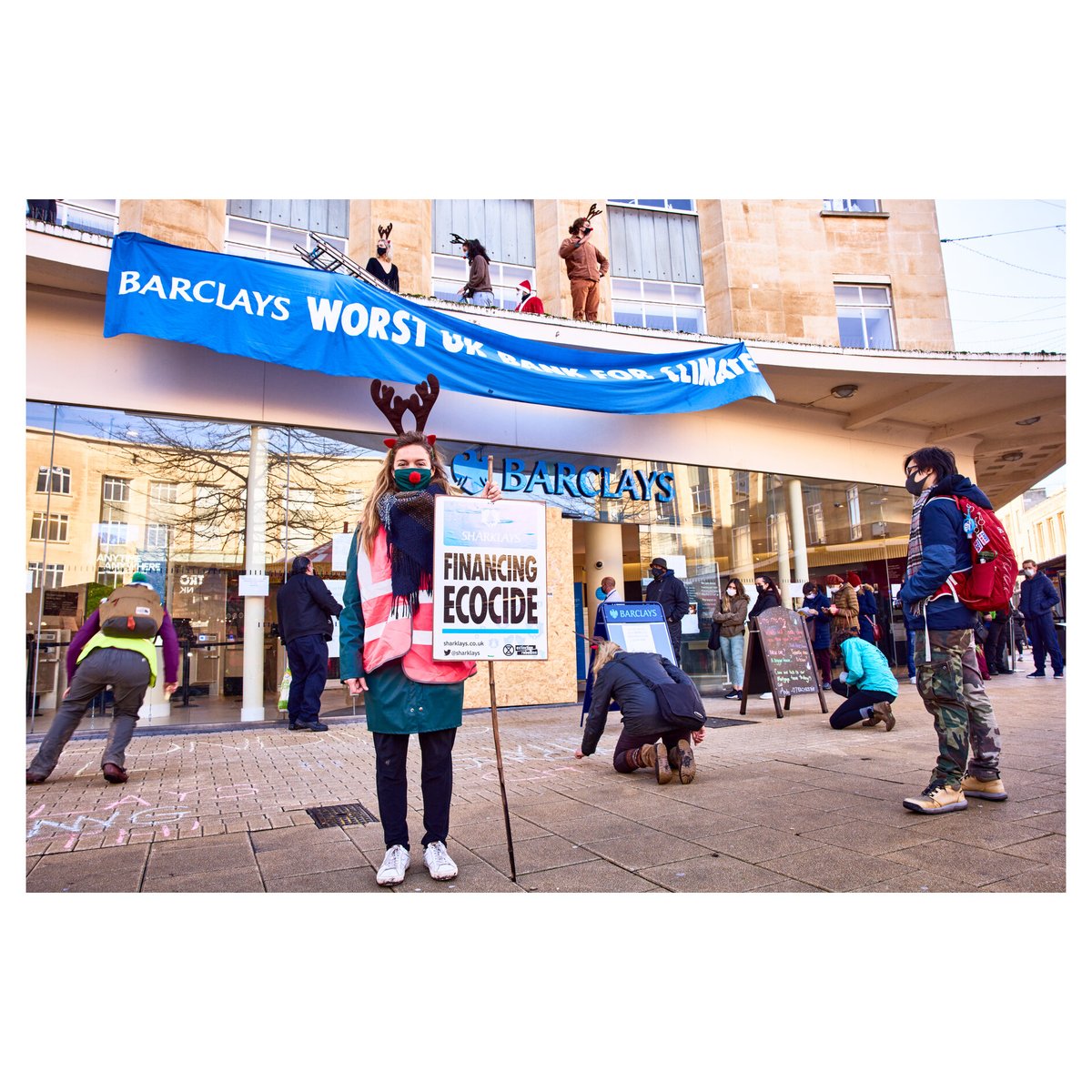 XRBristol's tweet photo. Santa is making a list and checking it twice. Number one on the naughty list is Barclays as the largest provider of financial services to the fossil fuel industry in Europe and the 7th in the world. 

Today we delivered coal to tell them to #cleanuptheiract!

📸 Simon Holliday https://t.co/D0ZDvGG8EU