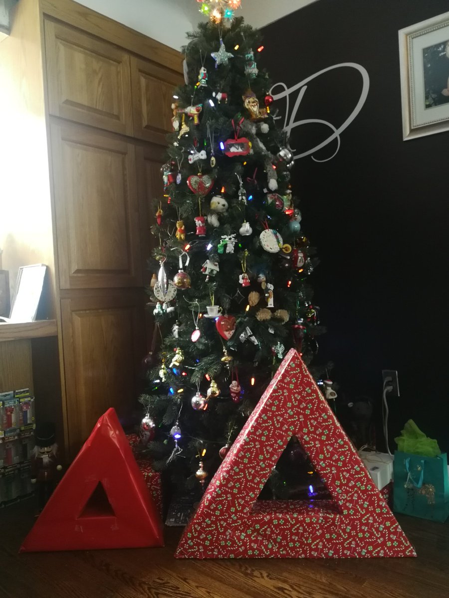 pezfiend81's tweet photo. hope my wrapping job makes others smile as much as it does me #xmas2020 #gifts https://t.co/WSqtVu7Fke
