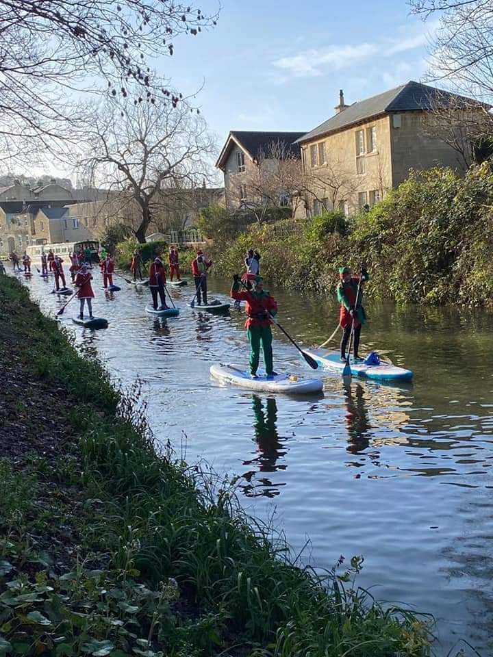 HLanePE's tweet photo. SANTA SUP!!! Bubbles of 6, 2m apart (tested the skills!) Thoroughly enjoyed spreading the Christmas cheer around Bath this evening! And the tunnel singing was epic! #bath #Santasup #christmascheer https://t.co/AFL5SHTItP