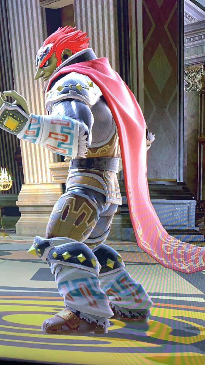 Daddy Ganon is trying to hide his with his cape 