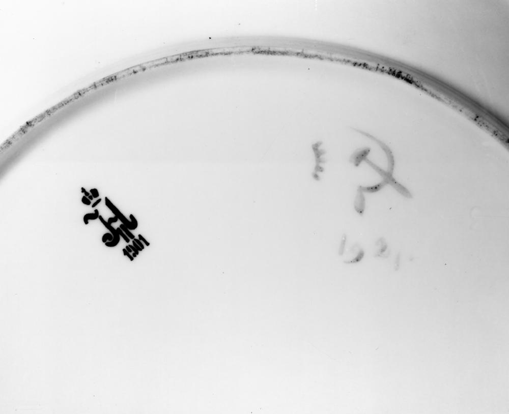 96. Russian Revolutionary PlateThis plate was originally blank, with a mark on the opposite side for Tsar Nicholas IITwenty years later, a Soviet factory painted the frontThey left the Tsar's mark because it was designed to be exported - sold as a collector's item