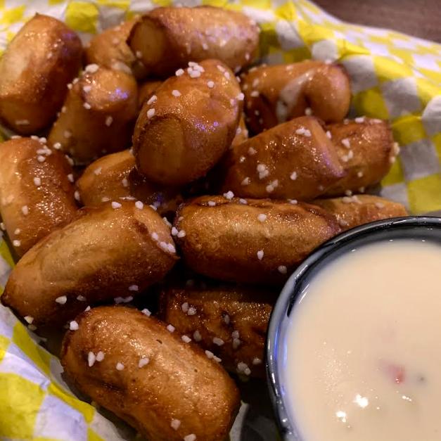 Rookiesnc's tweet photo. What’s better than soft pretzel bites? Homemade queso to go with it! This perfect pair is sure to have you asking for seconds. 🥨🧀

#RookiesNC https://t.co/l2ILFlGvMa