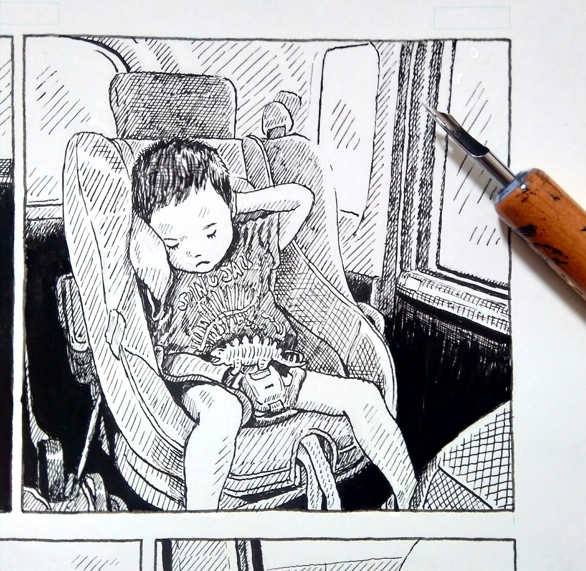 漫画、少しずつ描いてます。険しい表情で寝る息子。 