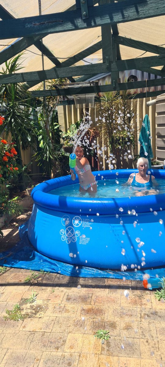 dockerjo1960's tweet image. Hot day calls for cooling down.  Mum and niece enjoying the pool. Niece missed me with the water pistol. #funinthepool #waterpistol #pooraim