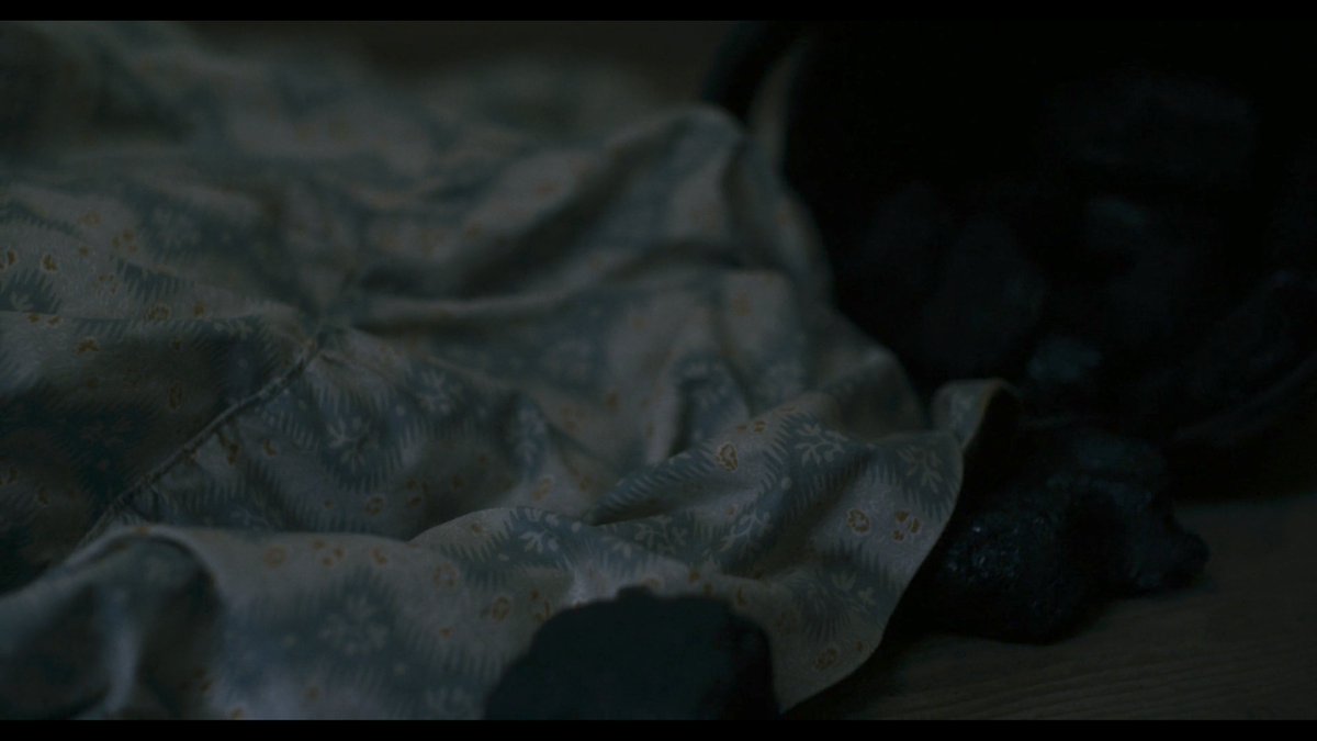 As a woman falls to her knees in  #Ammonite, sobbing with grief, the camera also falls away.It moves to her clenched hands before finally settling on the hem of her dress.Her sobs can be heard yet all we see are the dress' floral patterns. Pretty surfaces mask such deep pains.