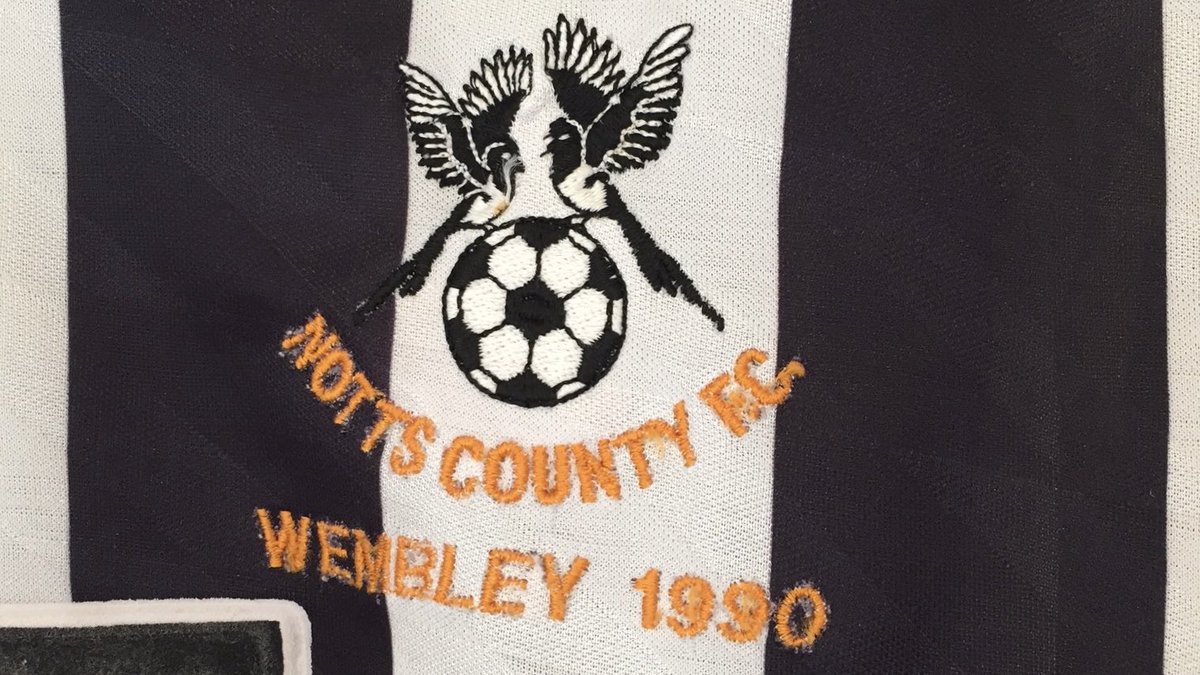 It has an interesting pattern that's quite difficult to see. The replica shirt featured an ave. velvety embossed badge but the player issue shirts had a great embroidered logo, as can be clearly seen in the match worn Wembley 1990 shirt.Wembley matchworn photo credit  @JoaoBeth