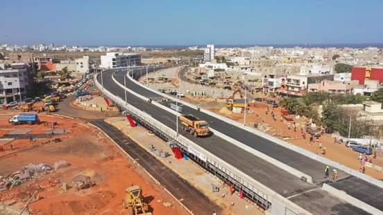 MA1970123's tweet photo. LES AUTOPONTS DE DAKAR: SOUS L'IMPULSION DU PRÉSIDENT MACKY SALL, NDÉKÉTÉ KHAR KANAM NDAKARU DAAL MOUNGI CHANGÉ TÉ KHAM NANÉ LÉGUI DÉSENCLAVEMENT DIÉKH TÉ EMBOUTEILLAGE BI TAXALIKO ACK ASKANE BI; MERCI EXCELLENCE. #MackySALL #ElhadjiKASSÉ #Kebetu  #RTT https://t.co/ixyz1Zf8VK