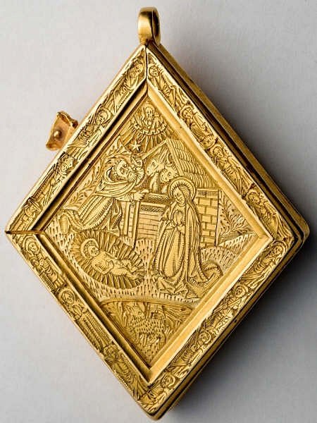 A medieval wearable nativity scene — reverse of the late 15th-century Middleham Jewel, from Yorkshire:  https://commons.m.wikimedia.org/wiki/File:Middleham_Jewel,_reverse_YORYM_1991_43.jpg
