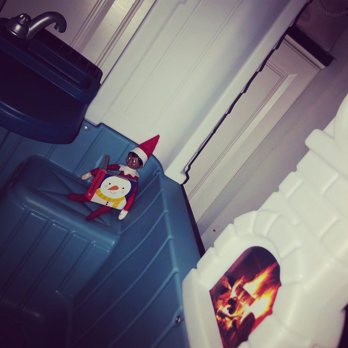 SymaChowdhry's tweet photo. Found Marco reading in the playhouse this morning! #elfontheshelf #marcoelf https://t.co/43MzLBAehz