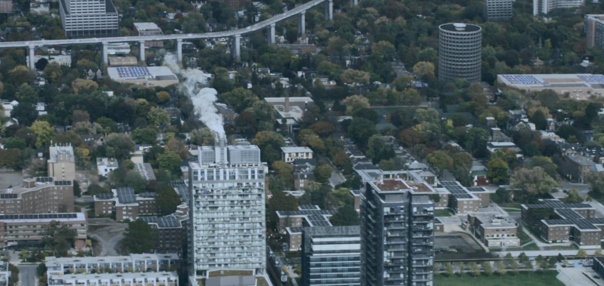 Episode 2 of Season 5 has plenty of rich detail, now there are longer scenes on Earth. Baltimore is a post-climate city: a sea higher than the city itself, widespread apartment solar. Interestingly: not a single car; but a heavy, prominent (electric?) train, cycles, walking.