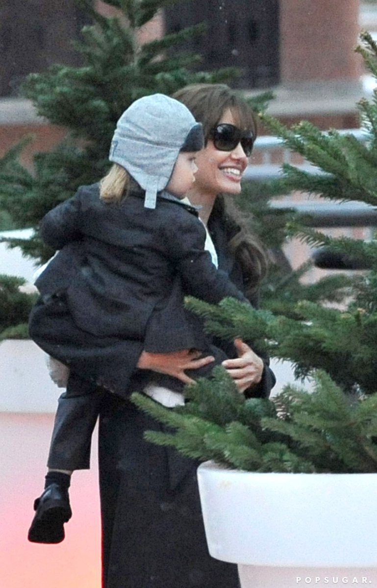 Joliethings's tweet photo. angelina and knox checking out christmas trees 🎄 https://t.co/WvgkxOSIrL