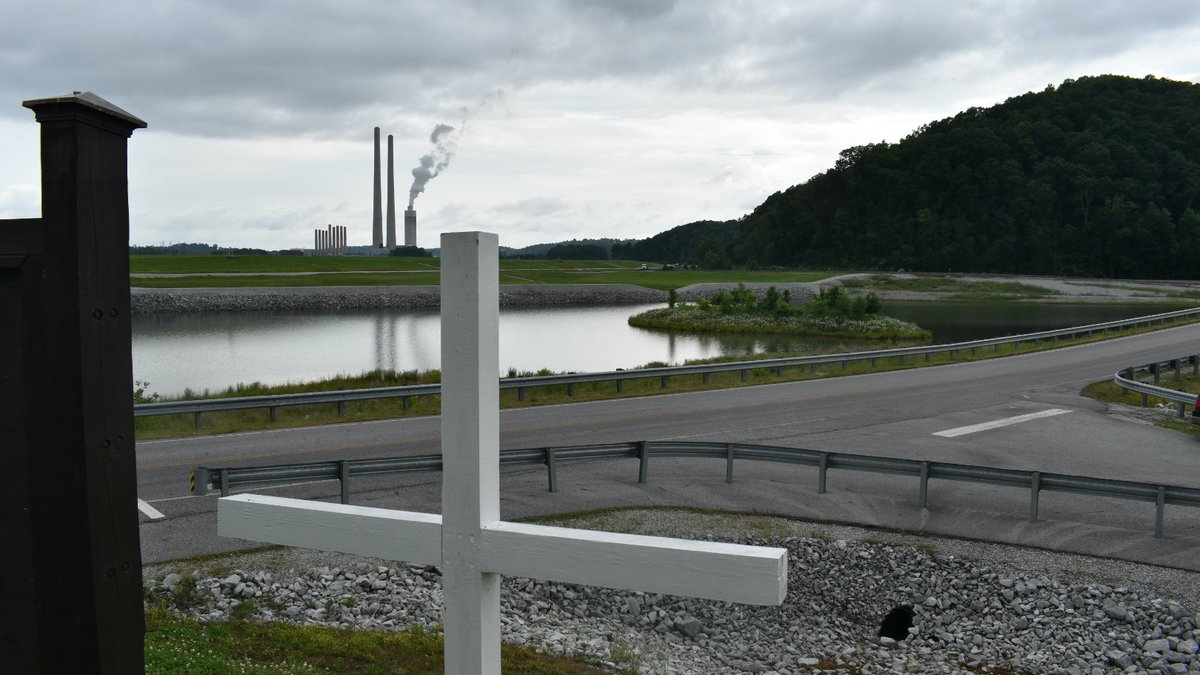 Right now, first responders & cleanup workers from the nation's largest industrial disaster are gathering in their cars and driving out to the 2008 Kingston spill site. Here, Ansol Clark, a former truck driver now severely ill with a rare blood disease, built an 8-ft white cross