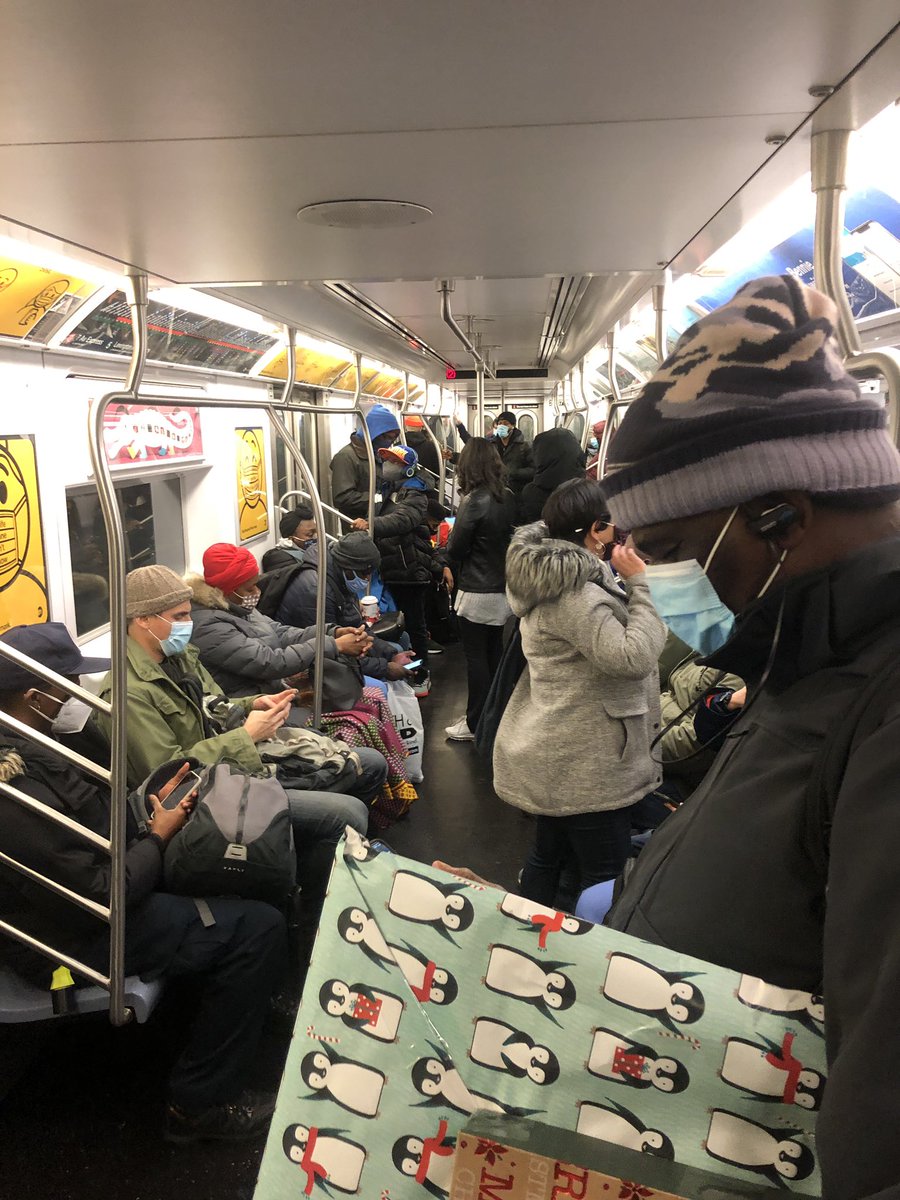 Hey, <a href="/NYGovCuomo/">Archive: Governor Andrew Cuomo</a>, how are restaurants a problem, but not this? I've spent hour and a half on a train this packed.