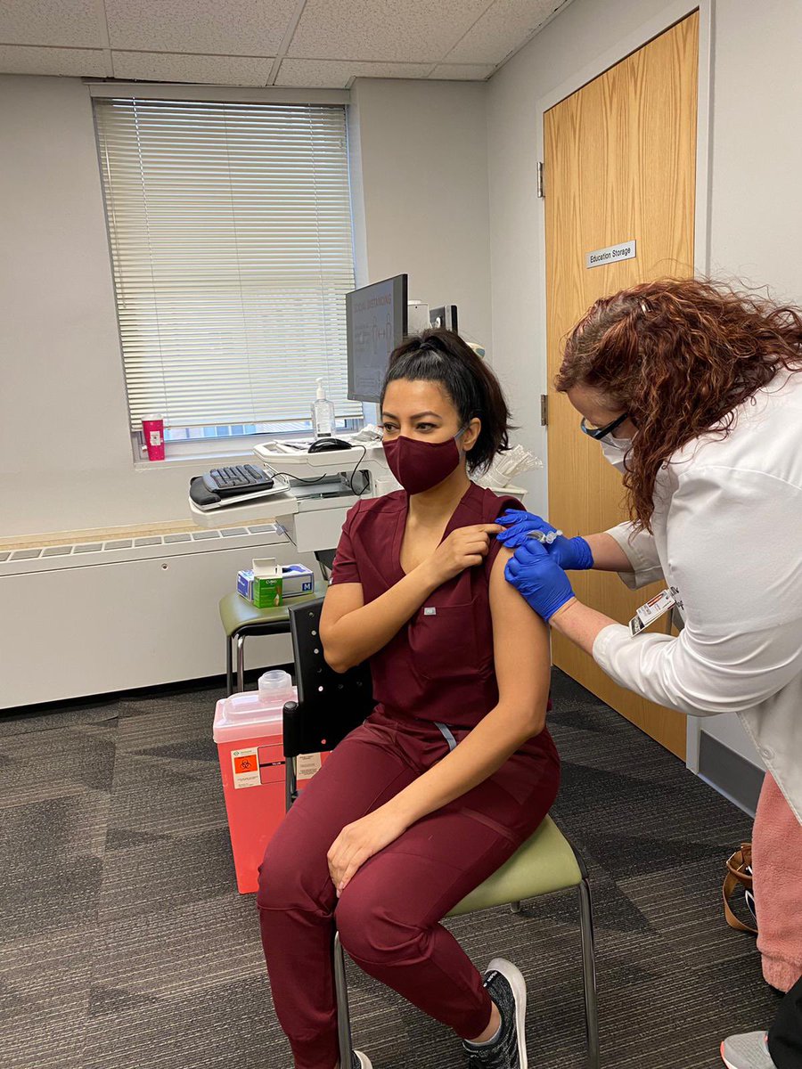 NazarethEMres's tweet photo. Our residents are getting #COVIDvaccinated  ! 📸 @FrooMDMBA getting her shot in her all burgundy @wearfigs 💃🏼 https://t.co/C5jXRru3BF