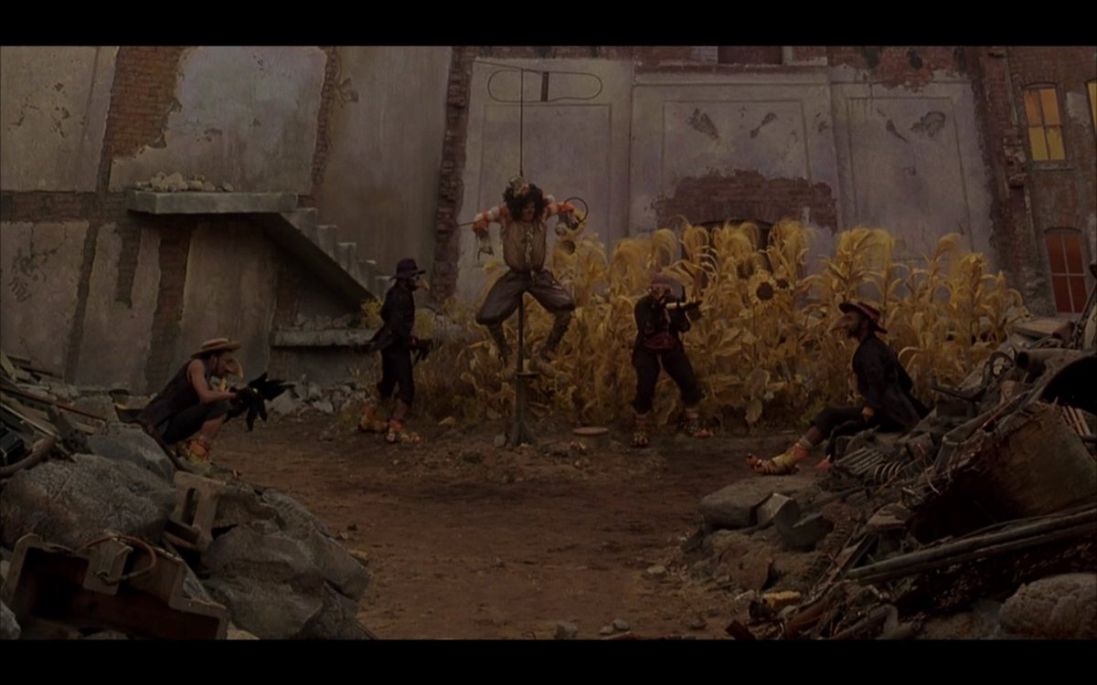 Scarecrow. He often said dumb things and was the idiotic jokester. He had no brain.